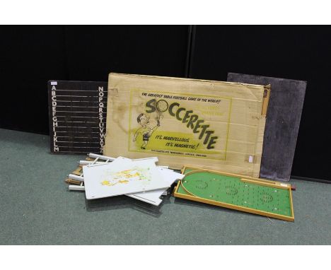 'Soccerette' vintage magnetic table football game, boxed, two blackboards, bagatelle board, dolls cot (4)