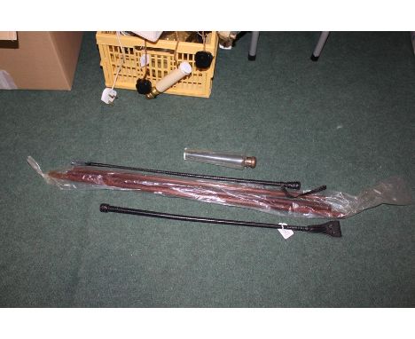 Three Snake wood walking cane shafts, together with two riding crops and a glass flask, (6)