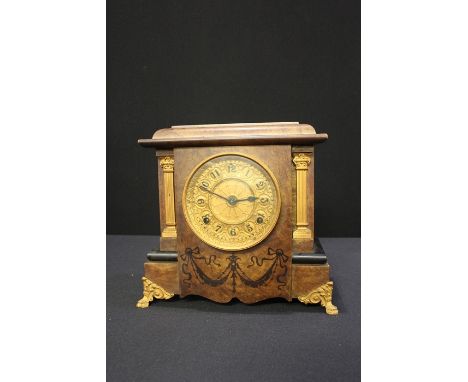 Early 20th Century Seth Thomas walnut veneered mantel clock, the filt dial with Arabic numerals, the case with reeded pilaste
