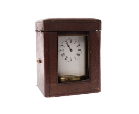 EARLY 20TH CENTURY FRENCH BRASS OVAL SHAPED CARRIAGE CLOCKthe movement unsigned, the white enamel dial with Roman numerals, w
