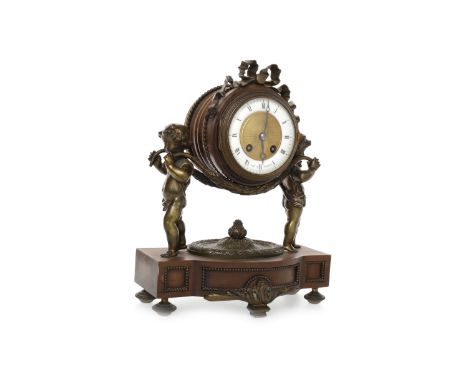LATE 19TH CENTURY FRENCH MANTLE CLOCKthe drum head with enamel chapter ring with Roman numerals and eight day movement, beari