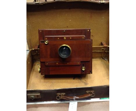 VICTORIAN HALF-PLATE CAMERA BY G. HAREwith Albion Albumenizing Co. 8 1/2 x 6 1/2 symmetrical lens, in fitted mahogany and bra