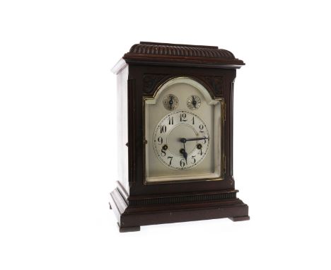 EDWARDIAN MANTEL CLOCKthe caddy shaped hood with reeded frieze, arched silverised dial below with Arabic numerals and 8 day m