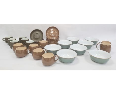 Seven Denby cups and saucers and matching jug in brown, five Denby cups and saucers and matching jug in green glaze and eight