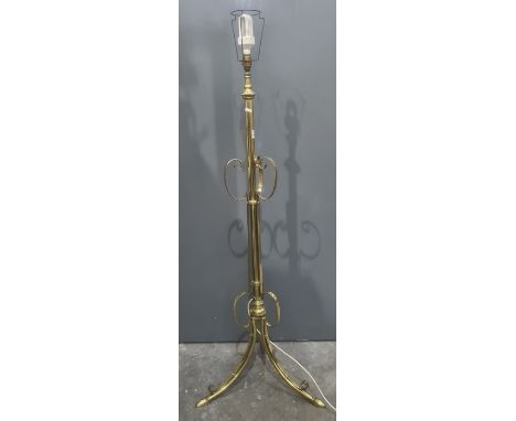 Modern brass standard lamp with scroll decoration