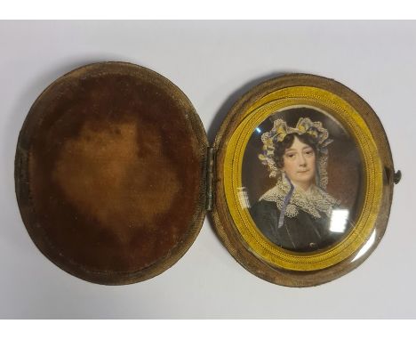 Samuel John Stump (1778/83 - 1863)Watercolour miniature on ivoryHead and shoulders portrait of a lady in lace bonnet with blu