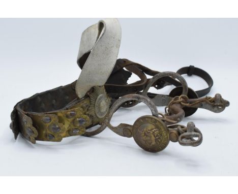 A 20th century British Army style horse bit with 'Peninsula Waterloo' brass marked fittings and reins together with a leather