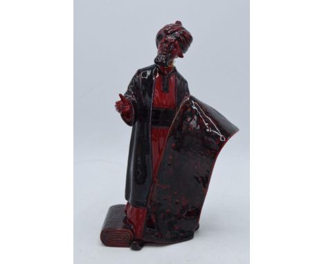 Royal Doulton Flambé figure Carpet Seller HN2776 (slight damage to thumb). In good condition with no obvious damage or restor