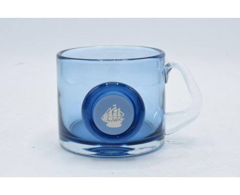 Wedgwood blue glass tankard with blue Jasperware cameo insert. 9cm tall. In good condition with no obvious damage or restorat