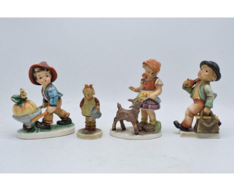 A collection of Goebel / Hummel figures together with two similar Friedel figures (4). Tallest 15.5cm tall. In good condition