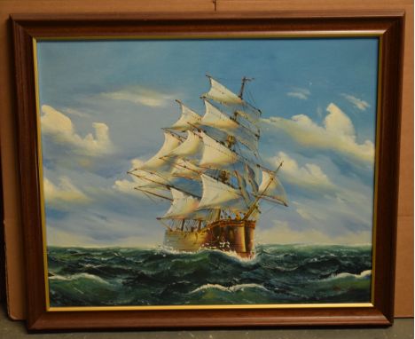 A framed 20th century oil on canvas style (print) depicting a sailing galleon at sea bearing signature to bottom right. 69 x 