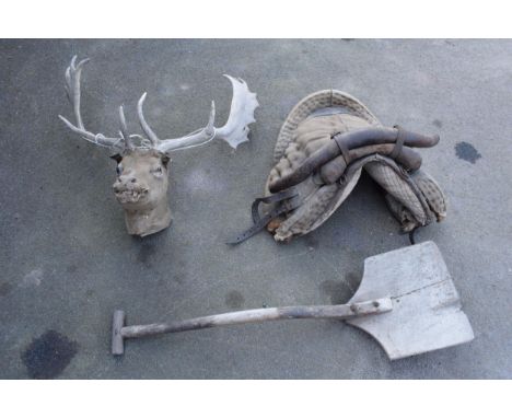 A mixed collection of items to include a vintage stalking saddle, wooden garden tool and a taxidermy deer head (in poor condi