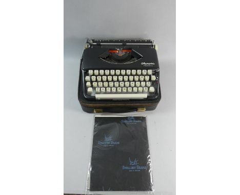 A Vintage Cased Portable Olympia Splendid 66 Typewriter 