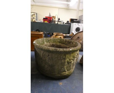 A Reconstituted Stone Garden Patio Planter Decorated in Relief with Cherubs, 60cm Diameter 