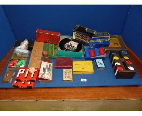 A quantity of vintage Games including a Belisha card game, two Pit Party games of cards, Poker chips, a roulette wheel by H. 