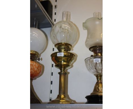 A brass Oil Lamp and shade