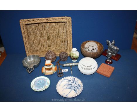 A basket containing a dragon tile, Maltese floral design dish, coconut bowl, 'Barry Island' inkwell, clansman figure, pewter 