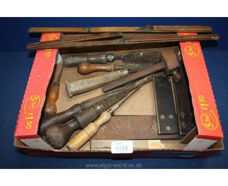 A quantity of various hand tools including ebony squares, boxwood folding measures, wood chisels, etc
