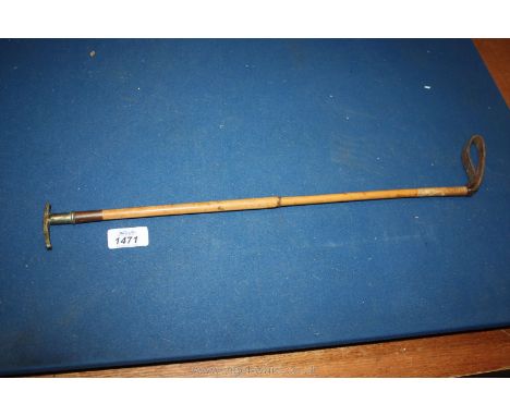A bamboo handled horse Whip.