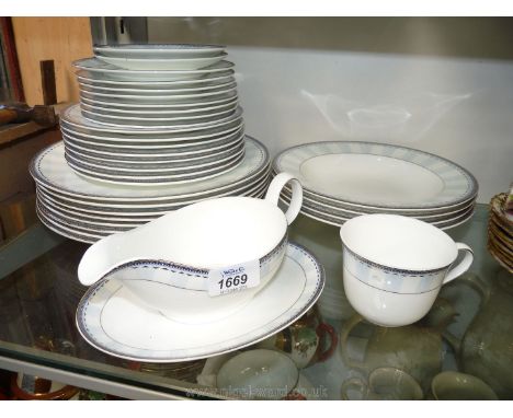 A Royal Doulton ''Westminster'' part Tea/Dinner service including eight tea plates, side plates, dinner plates, four dishes, 
