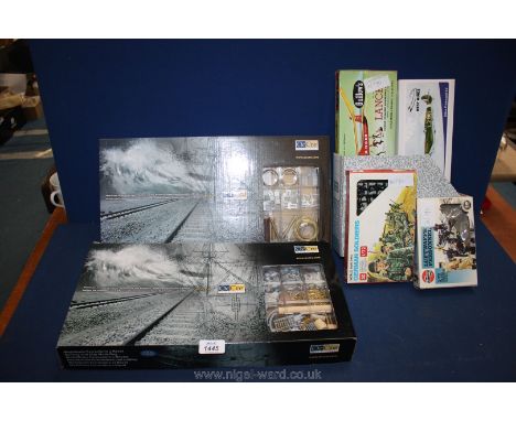 An Adler steam locomotive and flat wagon kit, three Adler Coach kits metal and wood together with a set of four model kits