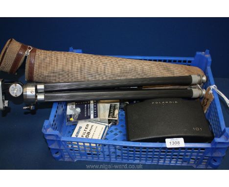 A Polaroid 101 Camera and tripod and accessories