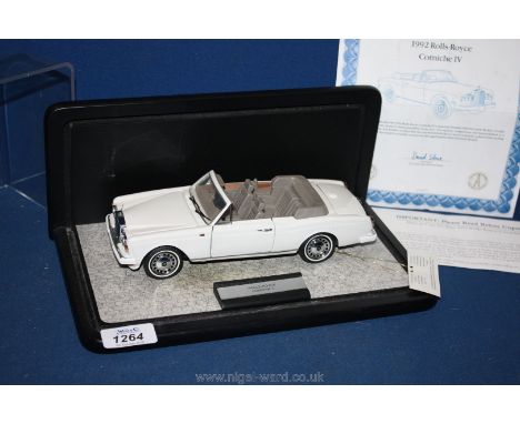 A Franklin Mint die cast 1/2 4th model Rolls Royce Corniche IV, in display case.