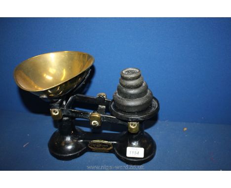 A set of F.J. Thornton & Co Ltd, The Viking Scales with brass scoop and weights.