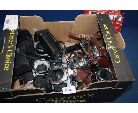 A large quantity of photographic camera bodies and lenses and others and a part card of cell batteries.