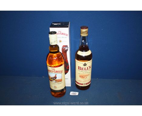 Two unopened bottles of blended Scotch whisky, Bells and Famous Grouse