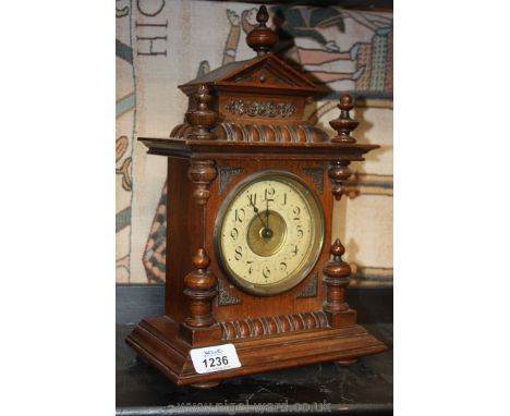 A small Mantle Clock timepiece