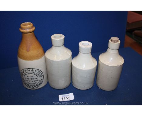 An early 1900's stoneware Bottle, Morgan & Evans stout and cider bottlers of Abergavenny and three plain stoneware bottles  