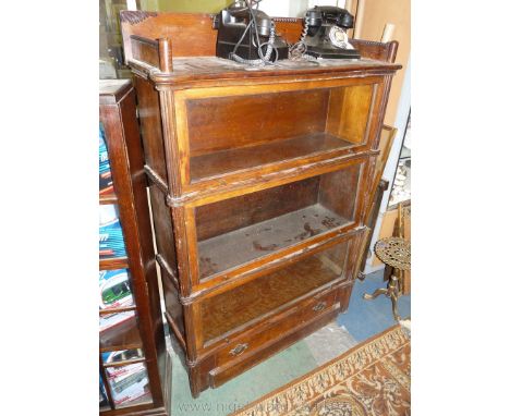 A Mahogany Globe Wernicke style three stage Bookcase with drawer to base and upstand to top, 54" high x 36 1/2" wide.