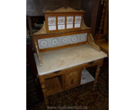 A stained Pine marble top Wash Stand with tiled back/upstand and central cupboard to the pot shelf, 36" wide x 51" high.