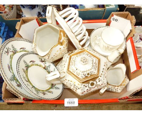 A Britannia pottery Art Deco white and gold Teapot and stand, milk and water jug, a gilt and white cup and saucer, toast rack