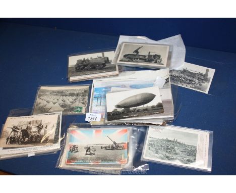 Fifty early 1900's Postcards including military: planes, tanks, anti-aircraft guns, etc. including a few early photos, some t