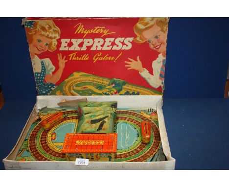 A "Mystery Express" clockwork tinplate novelty Train set. Working, with key, 1950's, in original box.