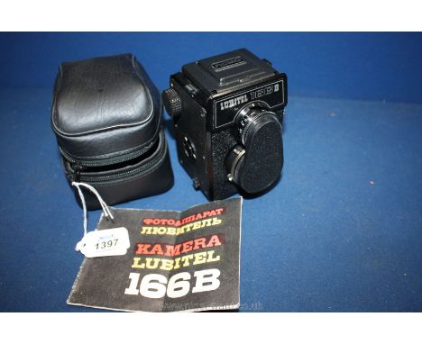A Lubitel Nomo Russian Camera, case and handbook