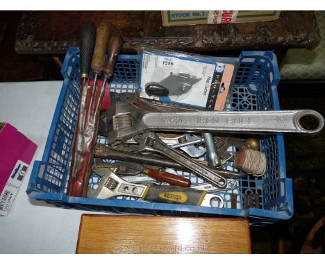 A quantity of adjustable spanners, various sizes, chain-saw files, a pry bar/cold chisel, a magnetic plumb line holder and br