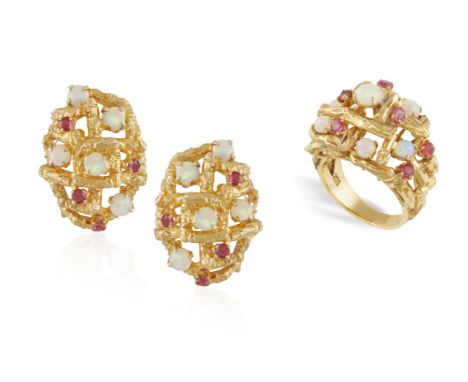 AN OPAL AND RUBY COCKTAIL RING WITH MATCHING EARCLIPS, of openwork bombé design highlighted with circular-cut rubies and cabo