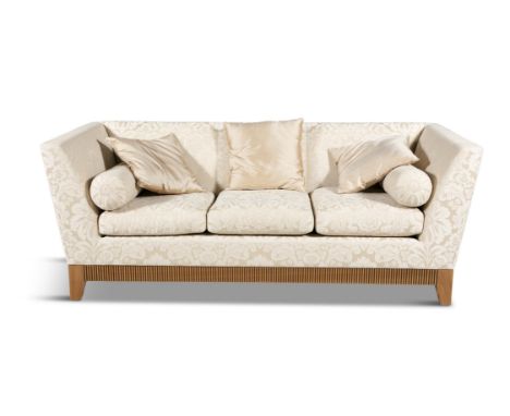 A THREE-SEATER SOFA BY LINLEY, of rectangular form, upholstered in gold/cream damask, with three drop-in seats, fluted apron 