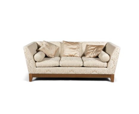 A THREE-SEATER SOFA BY LINLEY, of rectangular form, upholstered in gold/cream damask, with three drop-in seats, fluted apron 