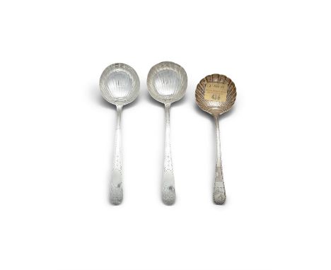 AN IRISH SILVER SAUCE LADLE, Cork c. 1770, mark of William Reynolds, the handle with feather edge engraving and scallop bowl;
