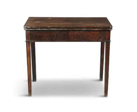 A GEORGE IV STYLE MAHOGANY RECTANGULAR FOLDING TOP CARD TABLE, the interior with baise lining, raised on square tapering cham