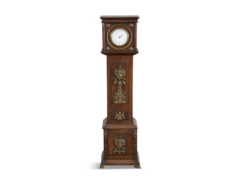 A MINIATURE MAHOGANY LONGCASE CLOCK, 19th century, the architectural pediment with four roundels formed as lion heads and a g