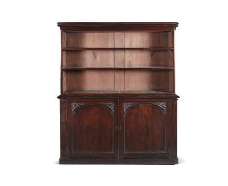 A VICTORIAN MAHOGANY BOOKCASE, of rectangular form, the open upper section with outset moulded cornice and shelved tiers abov