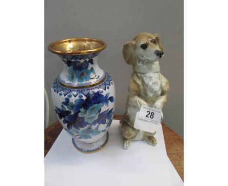 A Capo-di-monte ceramic dachsund with fitting for light and an enamel vase