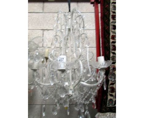 A 6 light glass chandelier