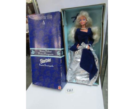 A boxed 1990's Avon exclusive Winter Velvet Barbie doll by Mattel