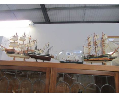 3 model galleons and a galleon in bottle